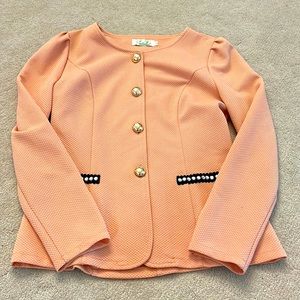 Salmon pink blazer, fitted with gold buttons
